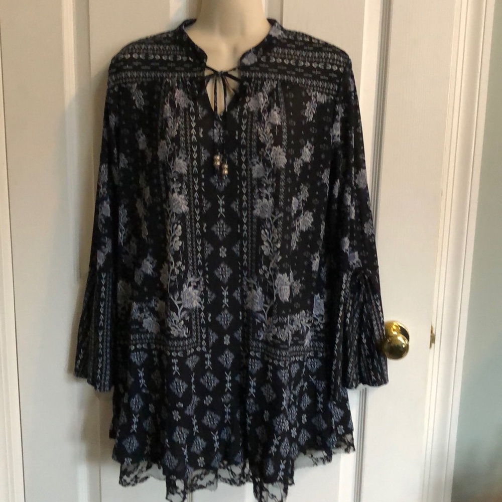 Black flowered long top.
